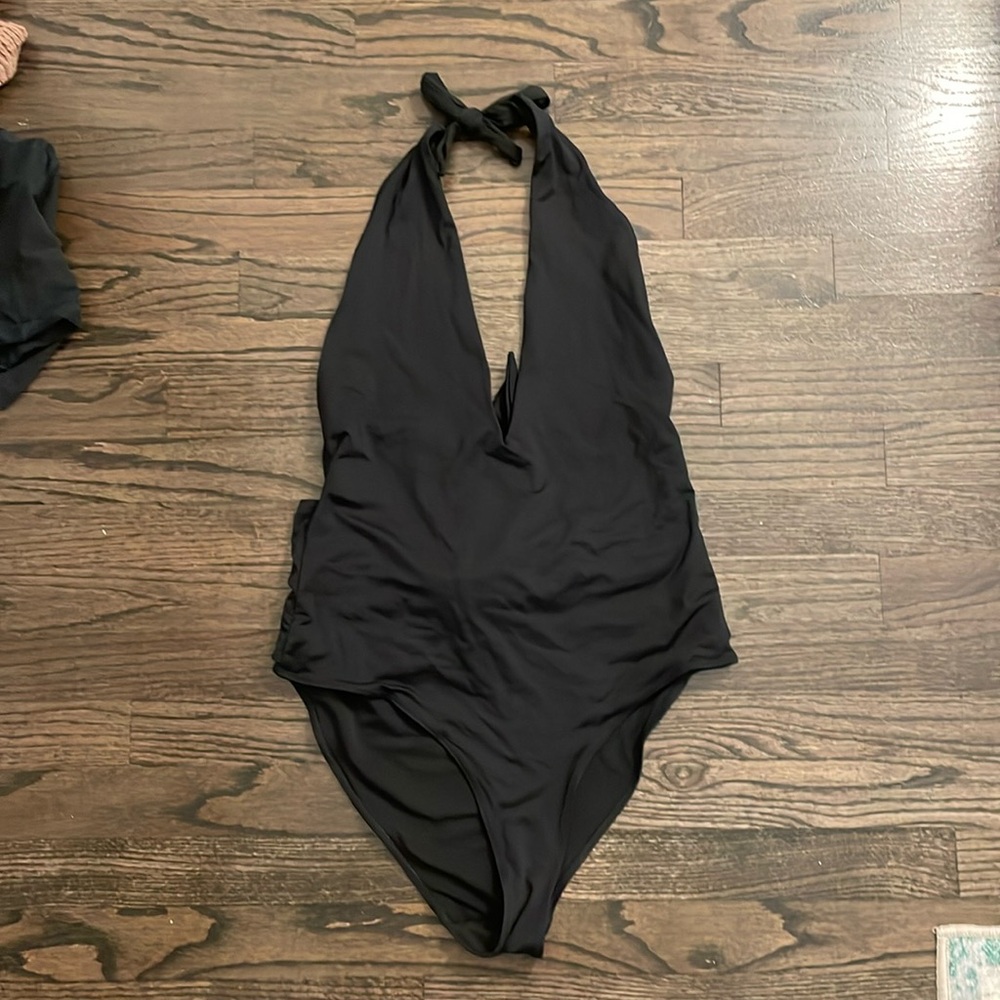 Full coverage black open back one piece swim suit